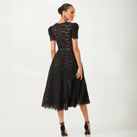 Helsi Amy DR6262 Black Lace Midi Dress with Floral Embroidery - Elegant black lace midi dress with short puffed sleeves, fitted bodice, flared skirt, plunging neckline, and blue floral embroidery.  Back View.