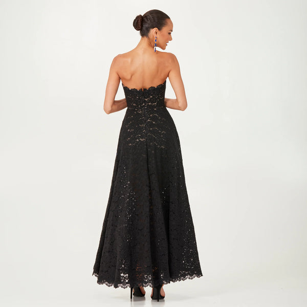 Helsi Patricia DR6252 strapless gown with blue floral embroidery - elegant black lace gown featuring a fit-and-flare silhouette and striking blue floral details.  Back View.