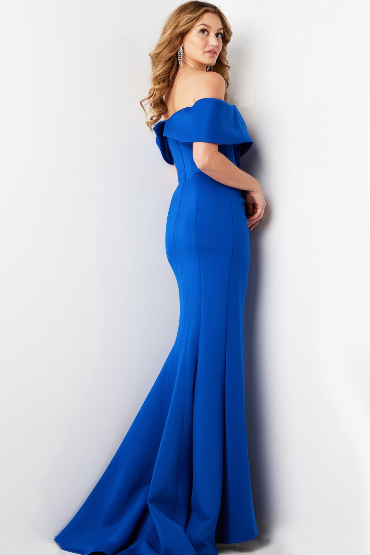 Jovani 37148 Off-Shoulder Gown in Royal Blue featuring a draped bodice and floor-length skirt, perfect for formal events and mother of the bride or groom occasions.