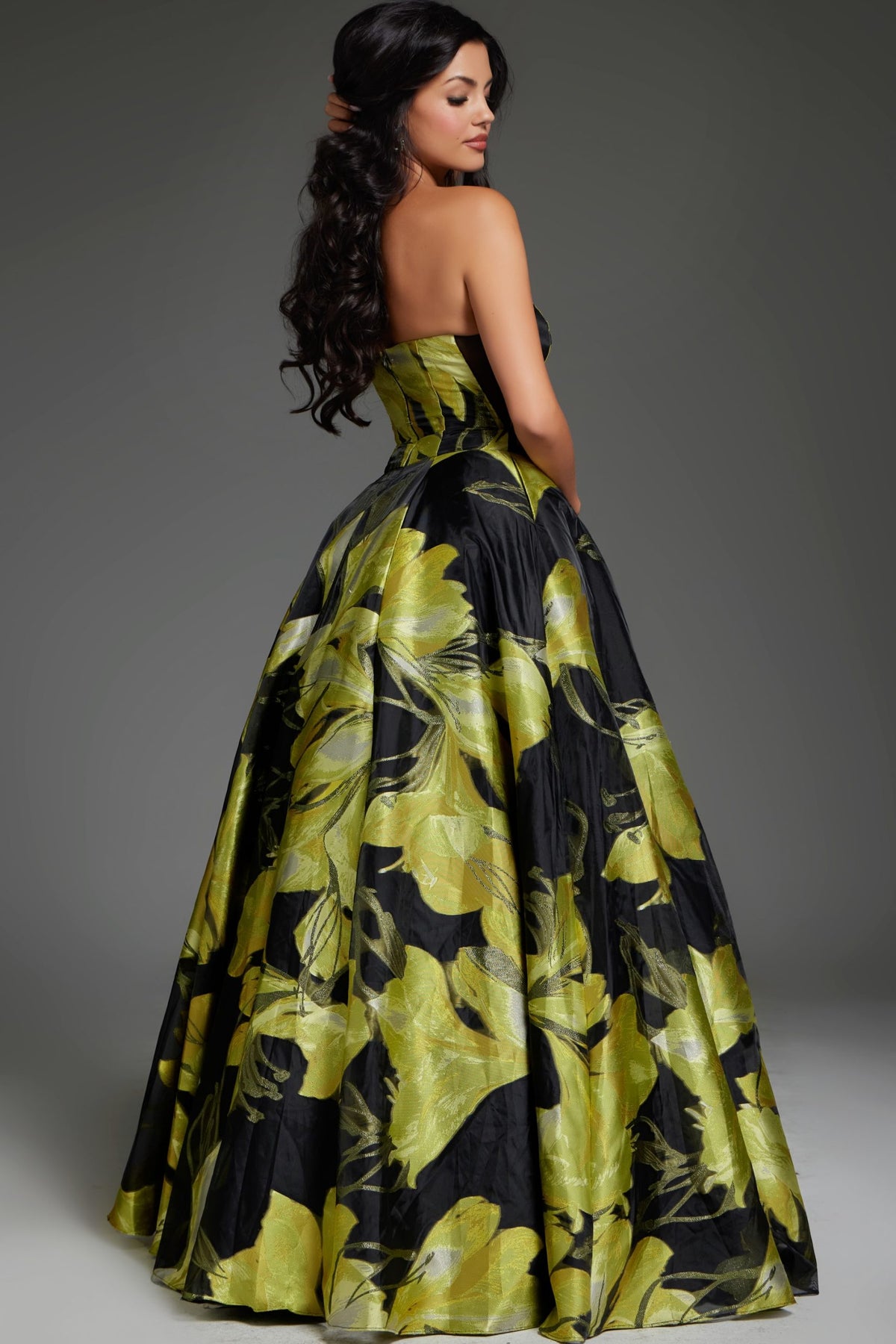 Jovani 42435 Strapless Floral Ball Gown – Elegant strapless gown with a bold green and black floral print, perfect for formal events.