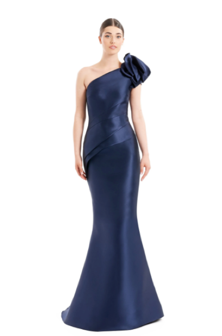 Alexander by Daymor 1673 one-shoulder gown with asymmetric design, pleating, and rosette detail, perfect for formal evening events and mother of the bride or groom. Model is wearing the color navy front view.