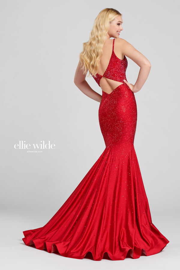 Ellie Wilde EW120012 Sleeveless Fit and Flare Gown - A stunning fit and flare gown featuring a plunging V-neck, stone accents, open bandeau back, horsehair hem, and sweep train, perfect for prom.