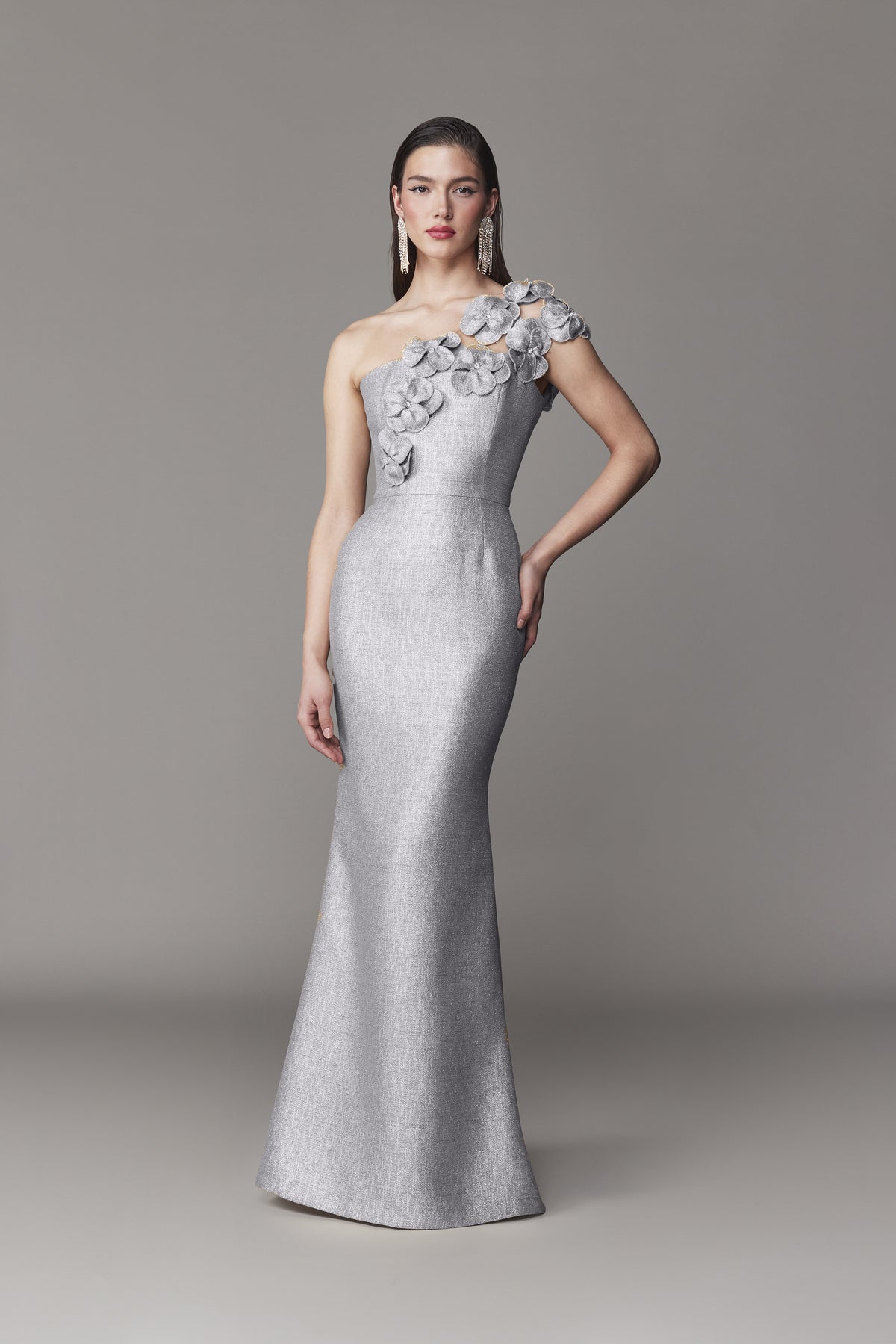 Frascara 4731 One-Shoulder Gown featuring 3D floral appliques with crystal centers, fit-and-flare silhouette, exposed gold zipper, and satin lining, perfect for formal events and Mother of the Bride or Groom.