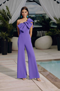 Frascara 4817 One-Shoulder Jumpsuit - Elegant jumpsuit featuring a one-shoulder neckline, front and back bow detail, wide-leg pant, and satin lining for a sophisticated formal look.