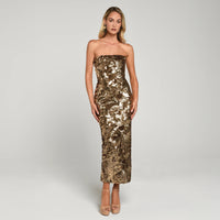 Helsi Leslie Sequin Body-Con Evening Dress – featuring abstract sequin pattern, structured stretch bodice, and boning for support.  The model is wearing the Leslie in ANTIQUE-GOLD.  Front View.