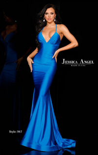 Jessica Angel 947 V-Neck Jersey Evening Gown - Elegant gown featuring a deep V-neckline, spaghetti straps, center back skirt ruching, and a back cutout in smooth jersey fabric.