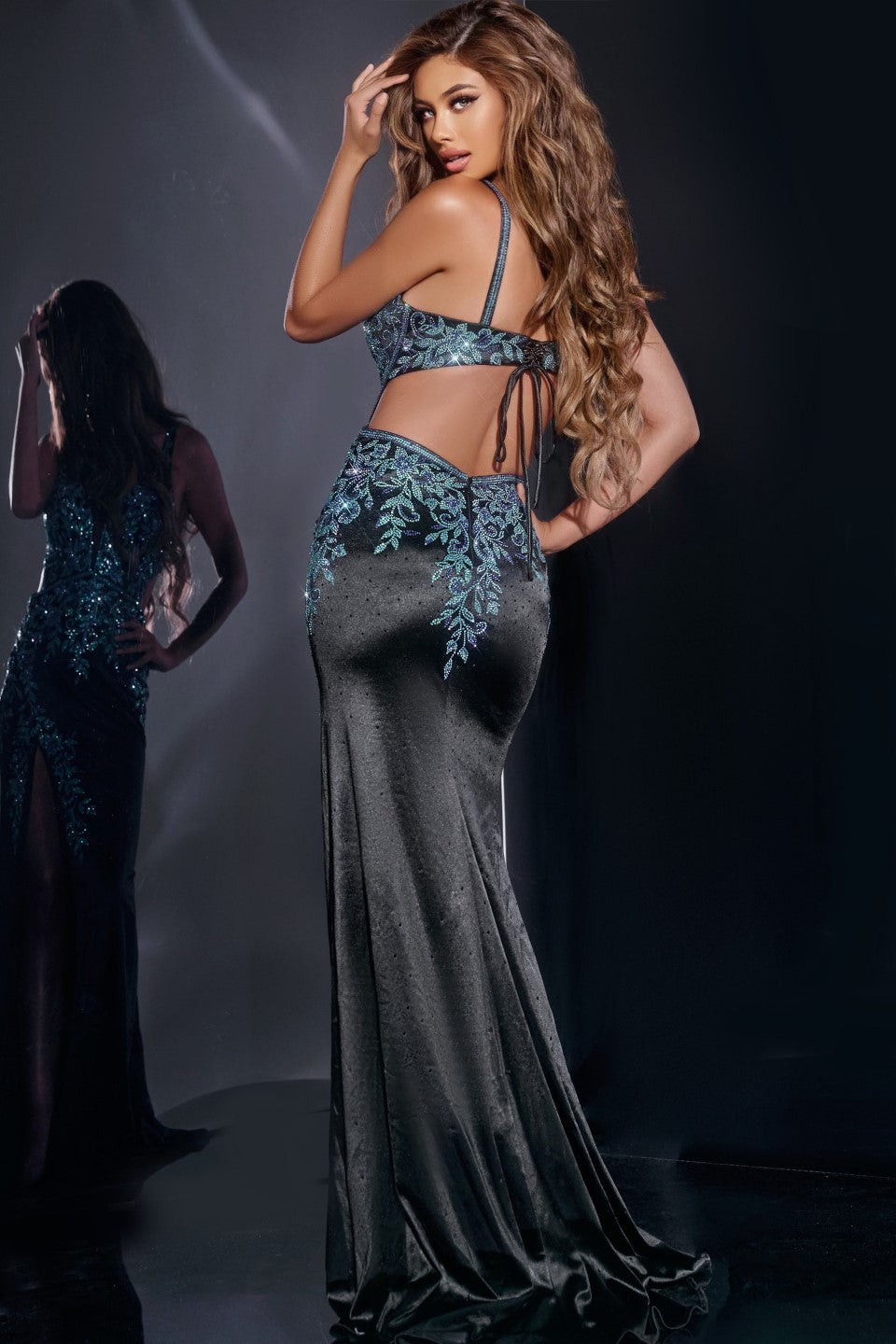 Jovani 43796 Plunging Floral Embellished Gown featuring a fitted silhouette, plunging neckline, floral embellishments, and high slit design.