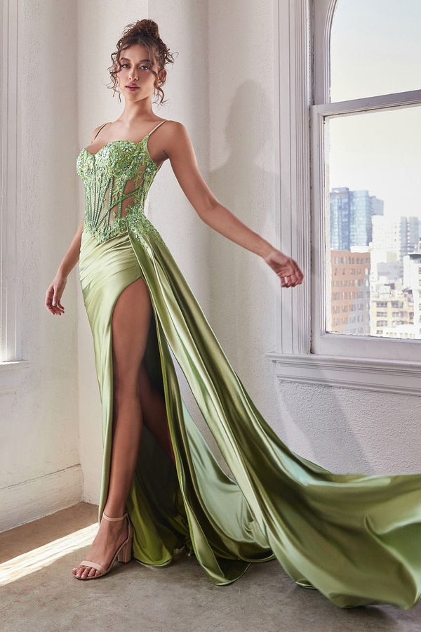 La Divine CD868 Fitted Lace Prom Gown - A sophisticated prom gown featuring a fitted silhouette, ruched waistline, embellished bodice with intricate lace detailing, leg slit, and a side sash that cinches the waist for a stunning look. The model is wearing the dress in the color greenary.