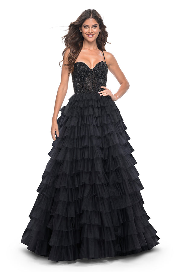 La Femme 32002 Glamorous Rhinestone Embellished Prom Dress - A stunning prom dress featuring a tiered ruffle skirt, fully rhinestone embellished bodice, high slit, and adjustable lace-up back for an elegant and customized look.