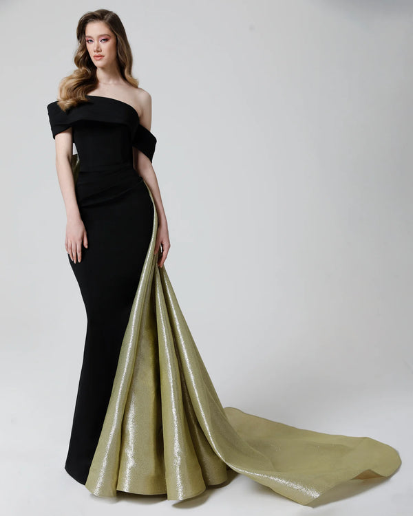 The Noor Fathallah N466 Elegant Strapless Evening Dress, a masterpiece in crepe and guazard, featuring a slit, off-shoulder design, and drapes on the bust for a glamorous evening look.