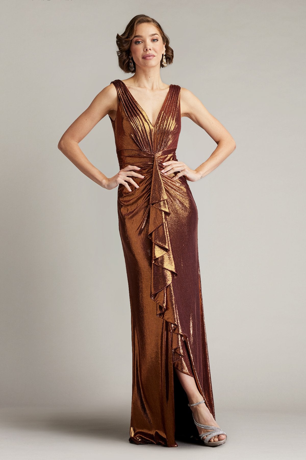 Tadashi Shoji BSJ24432L Metallic Waterfall Drape Gown – A shimmering copper gown featuring a V-neckline, pleating detail, and cascading drape, perfect for evening events.