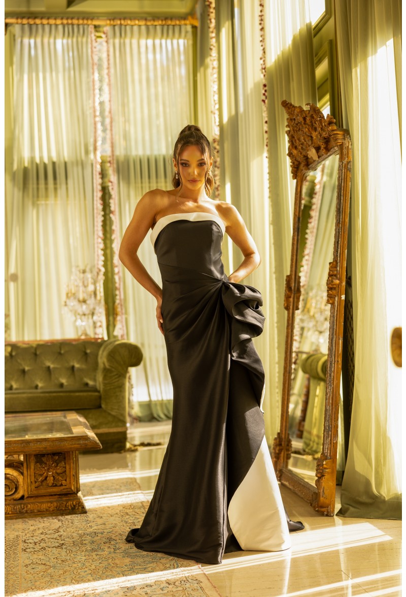 Terani Couture 242E3151 Black and fuschia Evening Gown - A sophisticated gown with a fitted bodice, mermaid skirt, and elegant black and fuschia detailing.