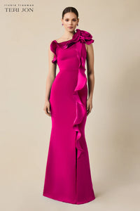 Teri Jon 249043 one-shoulder gown featuring a cascading ruffle detail and fitted silhouette. Perfect for formal evenings and mother of the bride or groom.  Model is wearing the dress in the color hot pink.